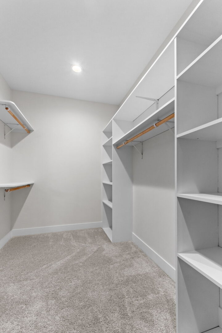 Some cloths cupboards in white color
