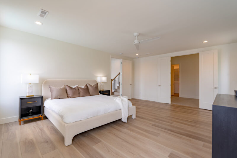 Second Primary Suite with clean modern finishes.