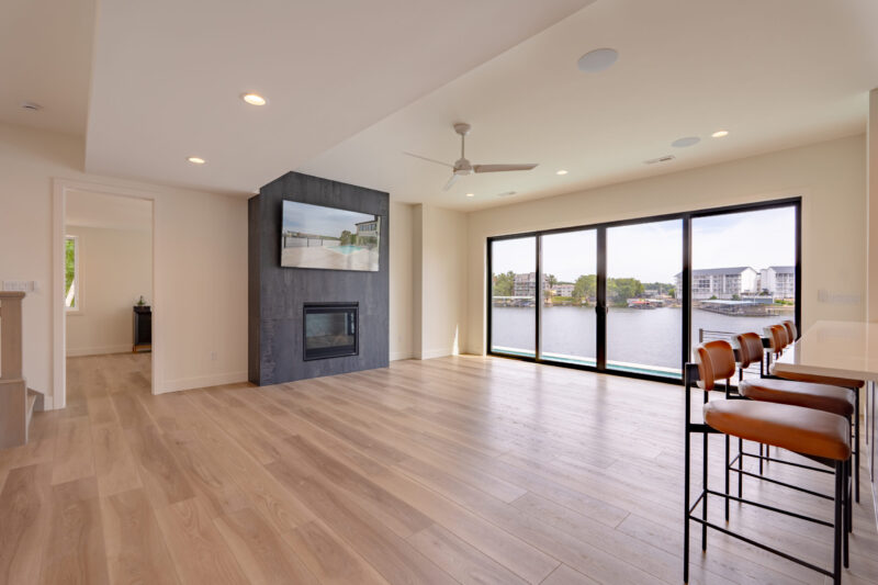 Basement Great Room with an entertaining area and large bar.
