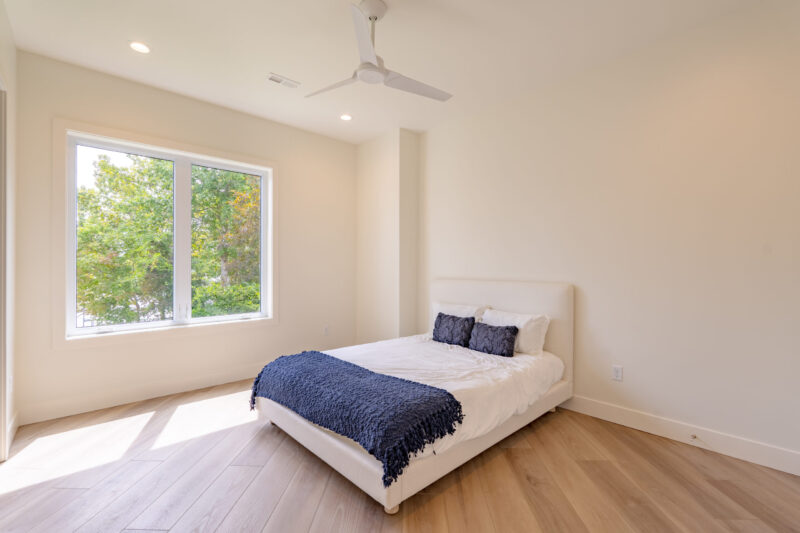 Bedroom 3 boasts a stunning view of the lake.