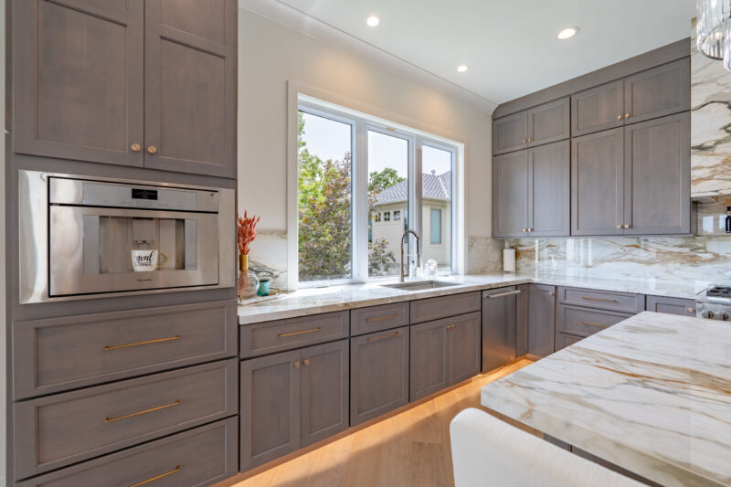 Kitchen sink with large picture window to overlook the lake. Built in espresso and coffee machine to make for easy morning bliss.