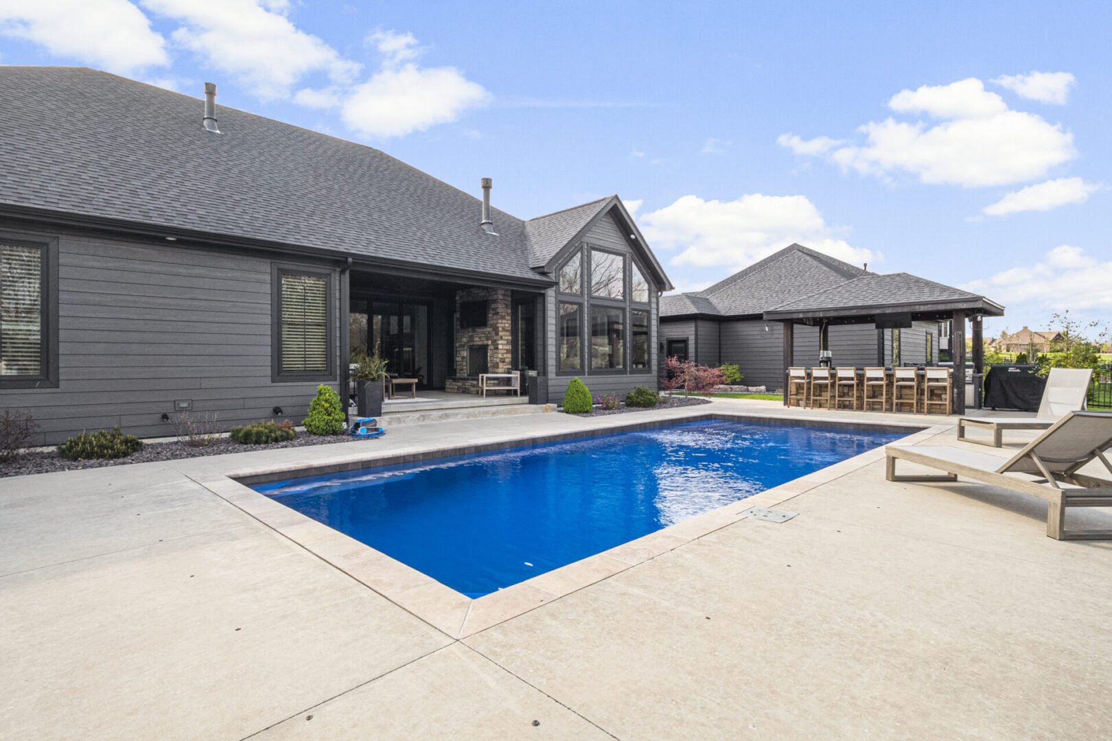 pool contemporary-mountain style-wooden beams-brick-stone